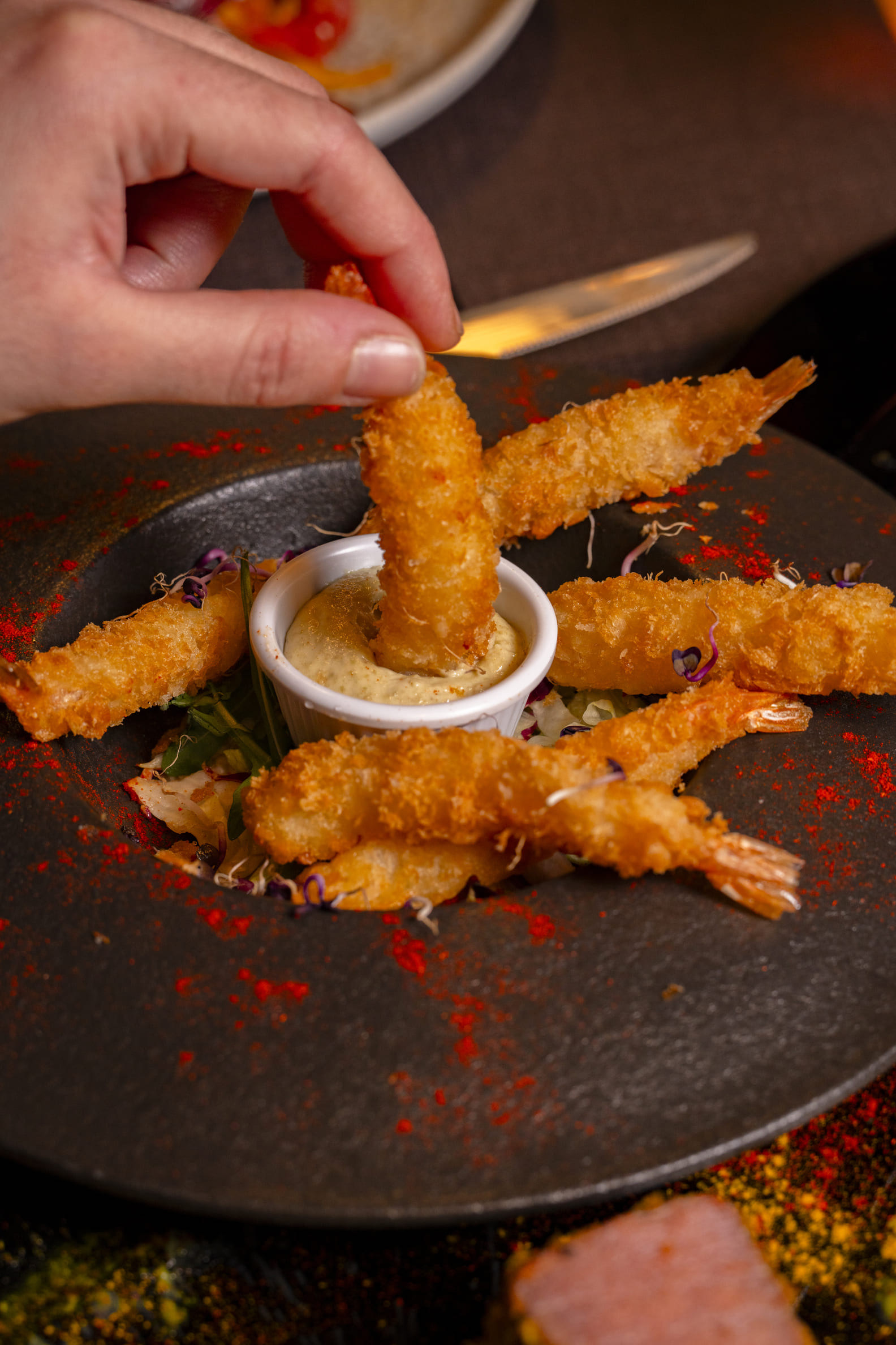 Gamberi in tempura serviti da Stocotto